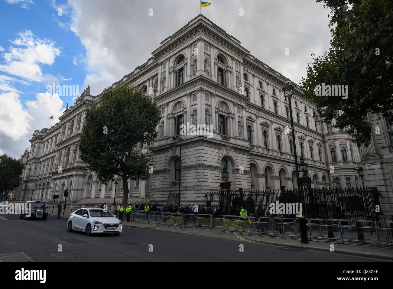 London, UK, 6th September 2022, Liz Truss becomes the UK's 56th Prime Minister and arrives in Downing Street. The heavens opened with torrential rain just before she arrived. She flew back from Balmoral after the Queen appointed her., Andrew Lalchan Photography/Alamy Live News Stock Photo