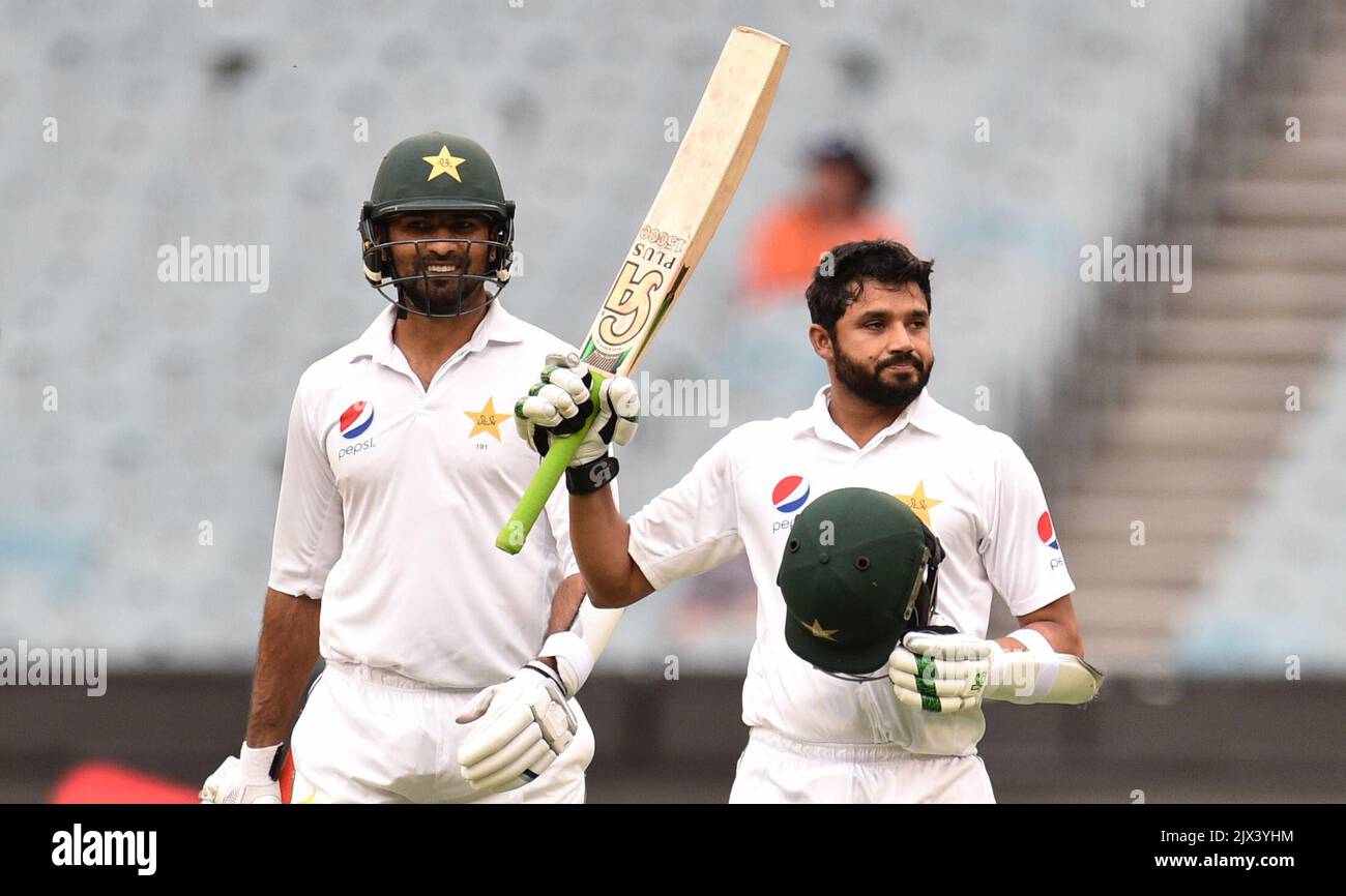 Azhar Ali of Pakistan (right) reacts after scoring 150 runs during the ...
