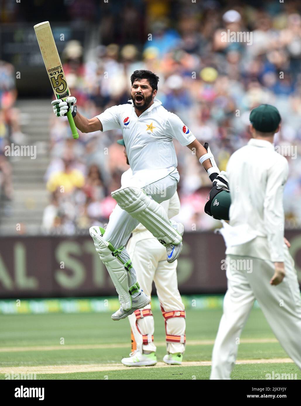 Azhar Ali of Pakistan (left) reacts after scoring a double century ...