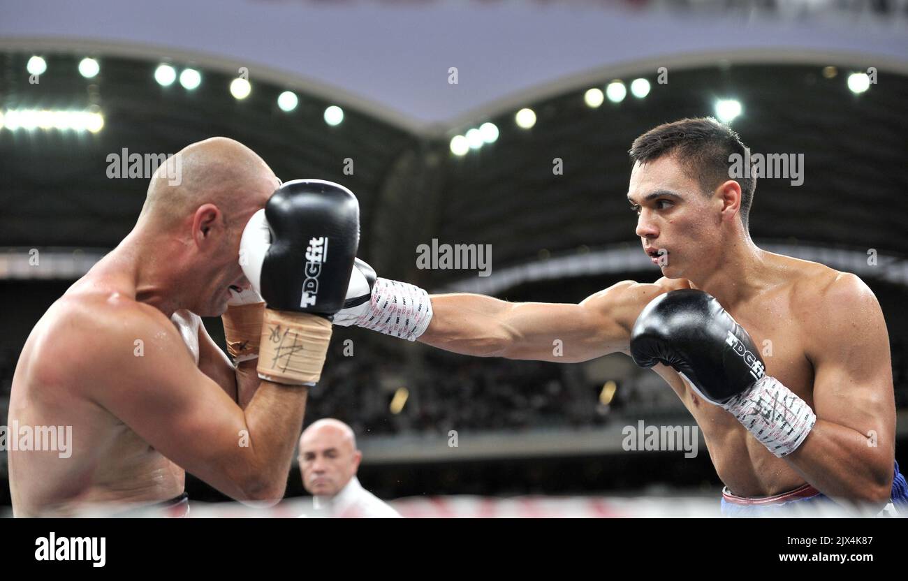 Australian boxers Tim Tszyu (right) and Mark Dalby fight during the fifth  fight of the undercard during the Boxing fight night between Australian  boxers Anthony Mundine and Danny Green at the Adelaide