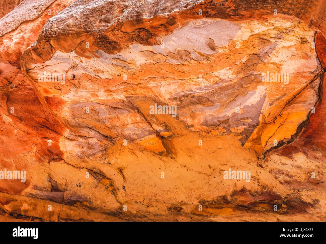 Colorful Canyon Wall Outher Siq Petra Jordan  Built by the Nabataens in 200 BC to 400 AD Canyon walls create many abstracts close up Stock Photo