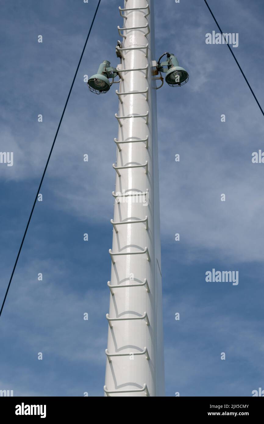 Ladder rungs on metal ship mast Stock Photo