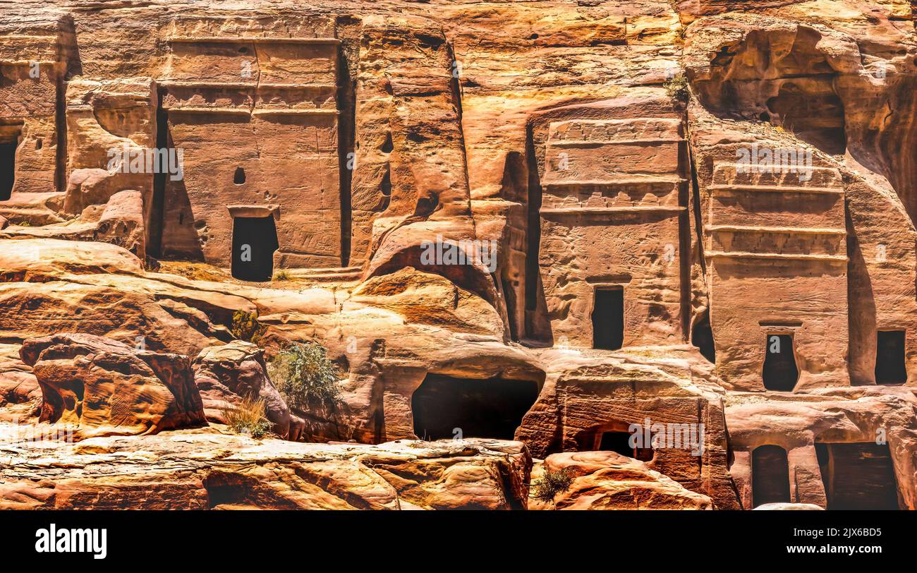 Rock Tombs Morning Street of Facades Petra Jordan Built by Nabataens in 200 BC to 400 AD Canyon walls change Rose Red afternoon when sun goes down Stock Photo