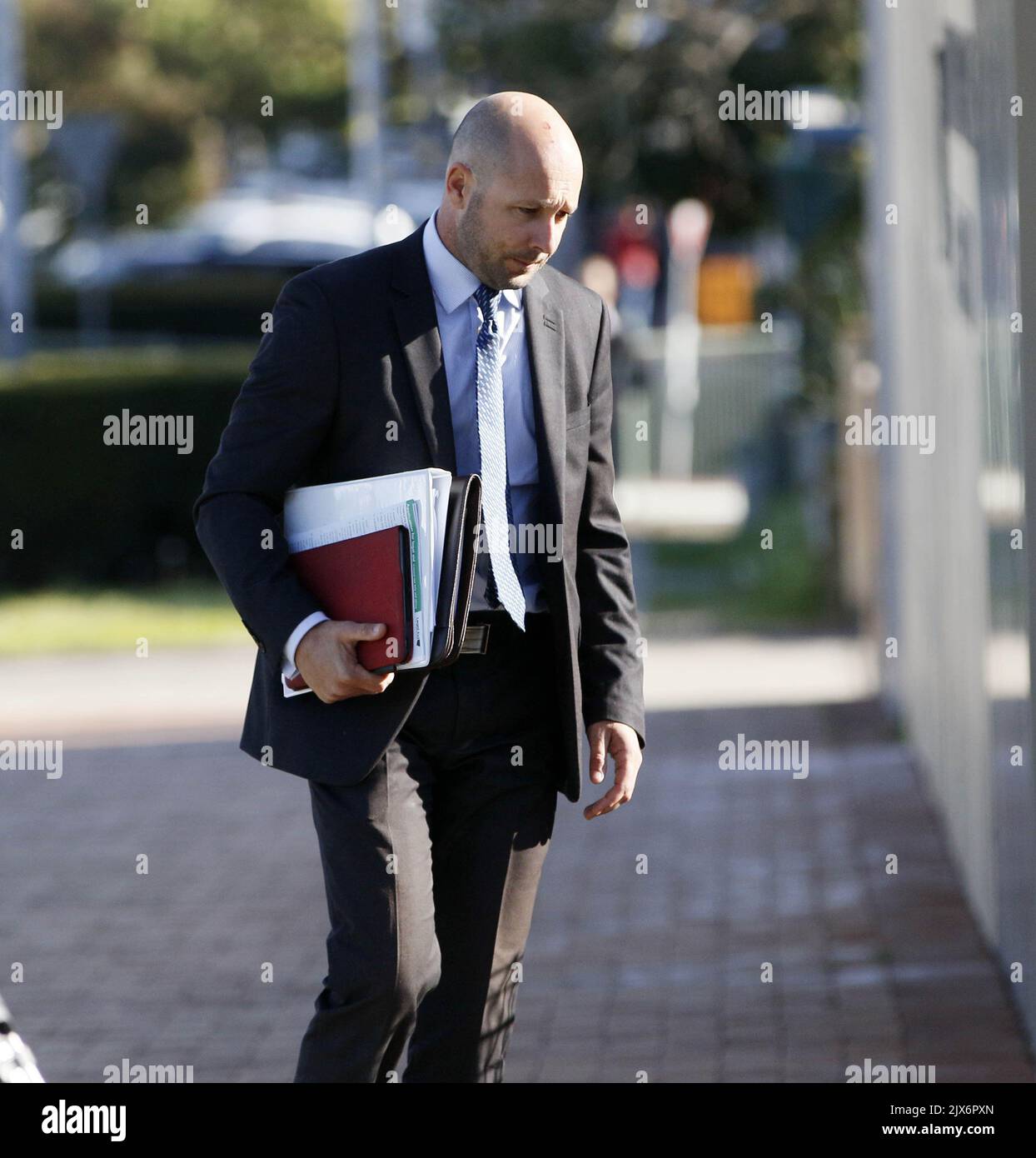 Darin Rispen Lawyer Matthew Unwin arrives at Raymond Terrace local Court north of ...