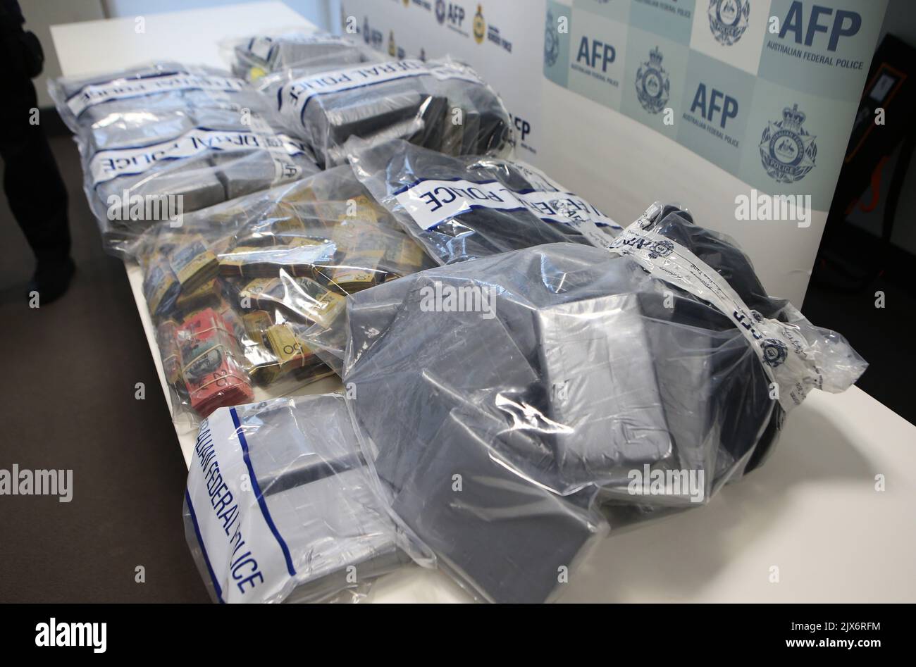 Seized drugs and cash on display at the Australian Federal Police ...