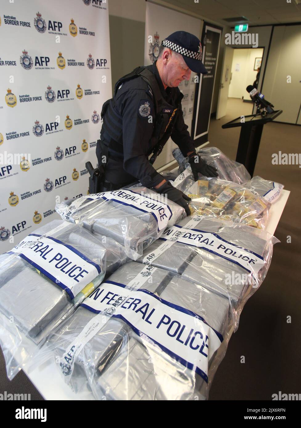 Seized drugs and cash on display at the Australian Federal Police ...