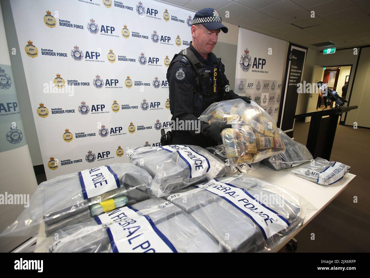 Seized drugs and cash on display at the Australian Federal Police ...