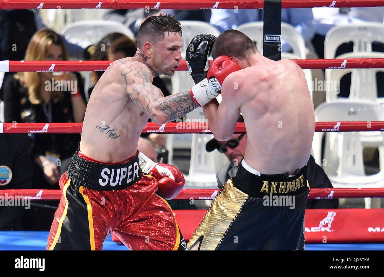 Australia's Damien Hooper (left) fights Russia's Umar Salamov during