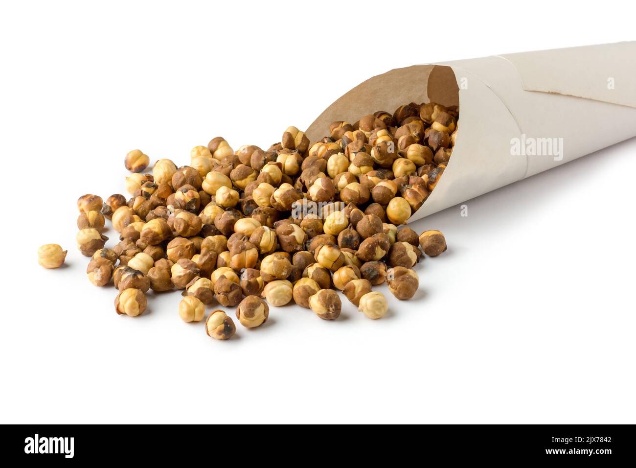 roasted and salted black chickpeas scattered from a paper cone, also known as bengal gram or desi chickpea, traditional and native oil free snack Stock Photo