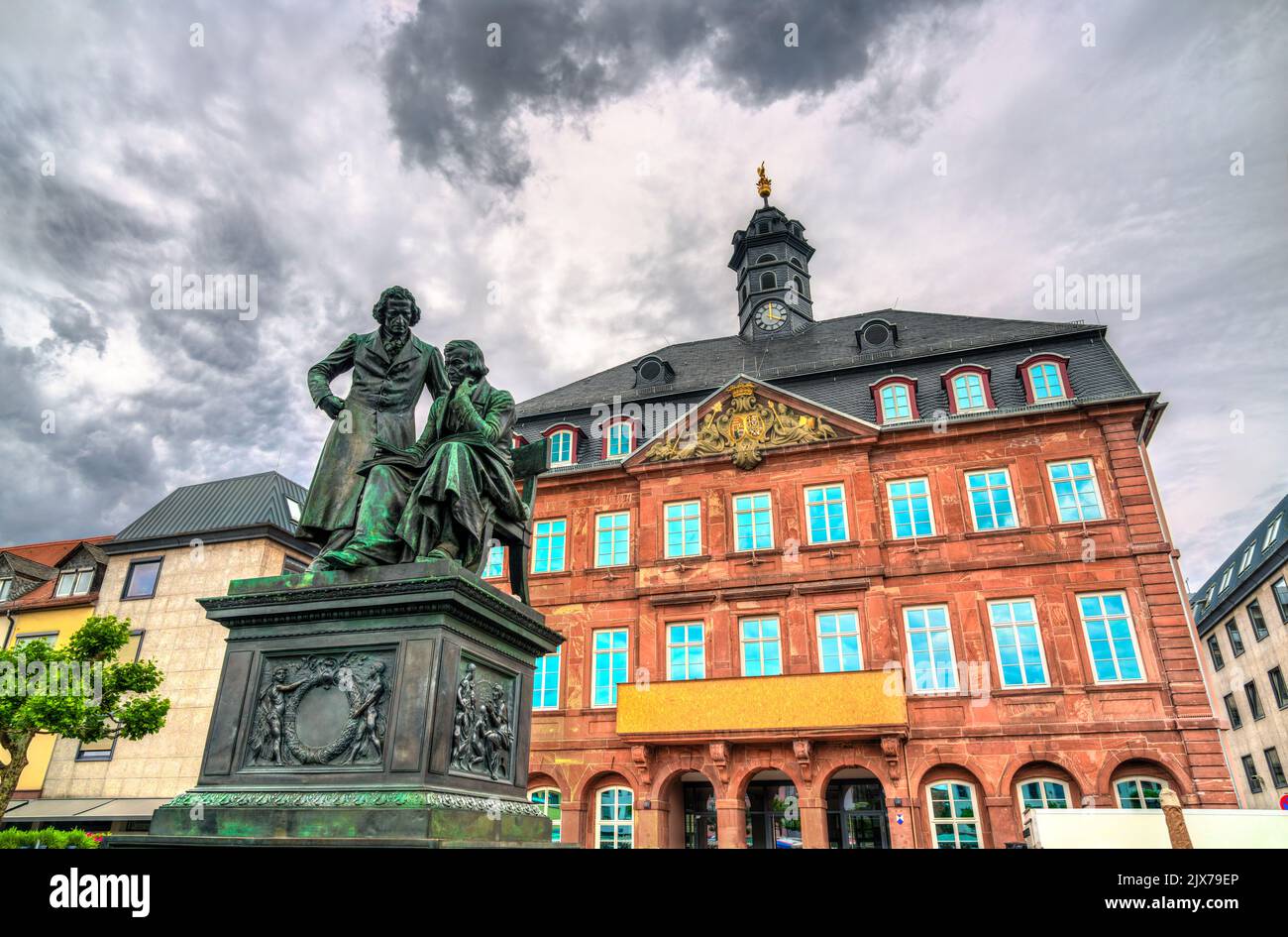 Monument to the Brothers Grimm and the Town Hall in Hanau, Hesse, Germany Stock Photo