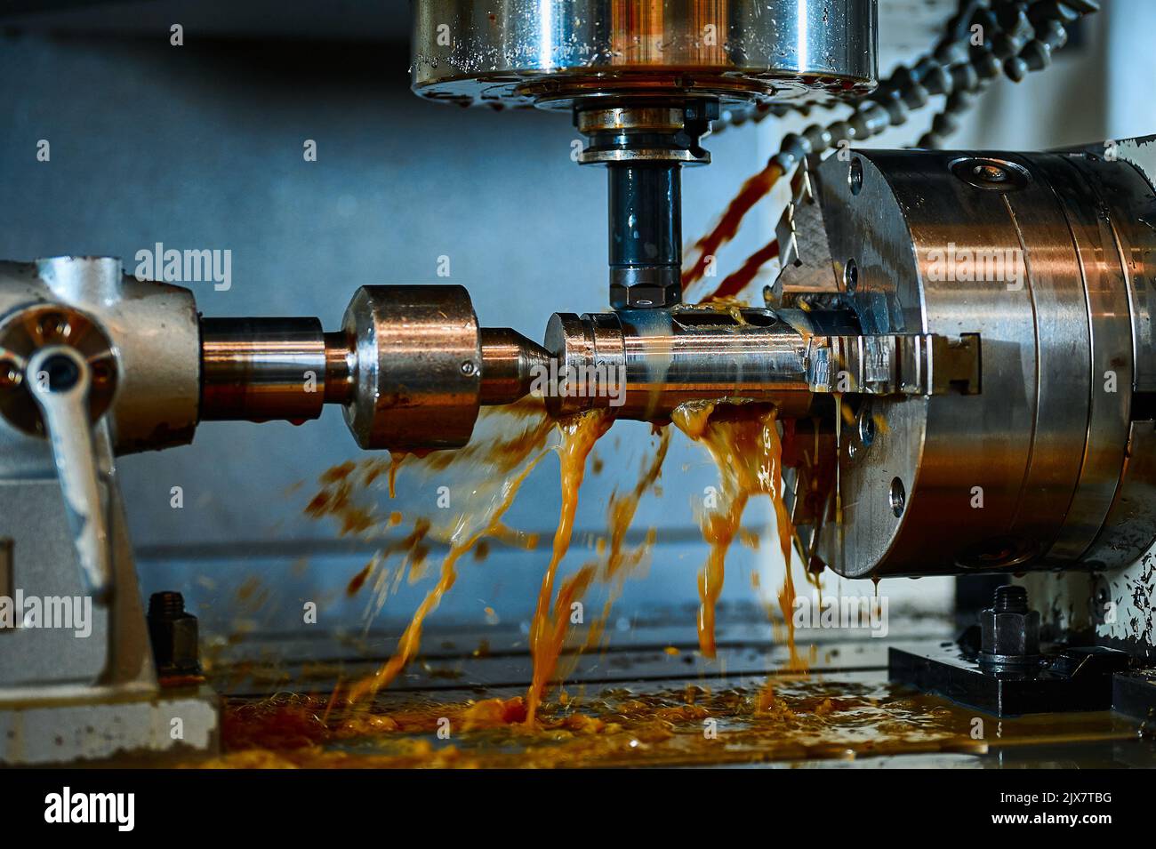 Processing metal detail with lathe machine tool in Stock Photo