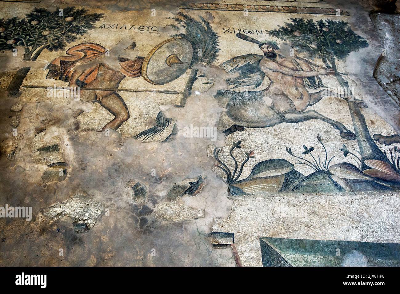 A mosaic depicting a warrior pursuing the centaur Chiron(right) at the Haleplibahce Mosaic Museum at Sanliurfa in Turkey. Stock Photo