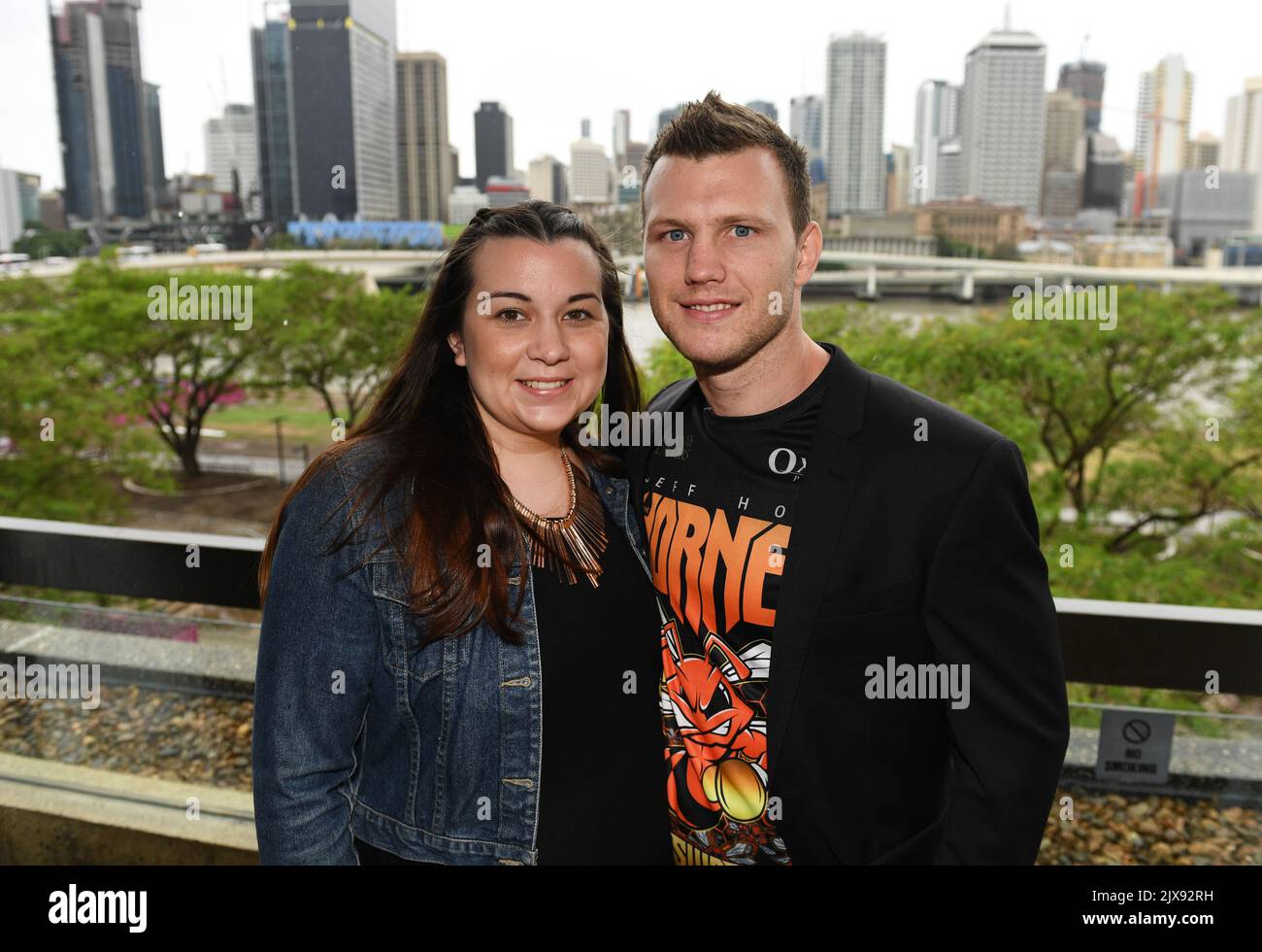 Australian boxer Jeff Horn and wife Joanne arrive to check in for their  flight at Brisbane airport, Wednesday, May 30, 2018. Horn will battle  American boxer Terence Crawford in a world welterweight