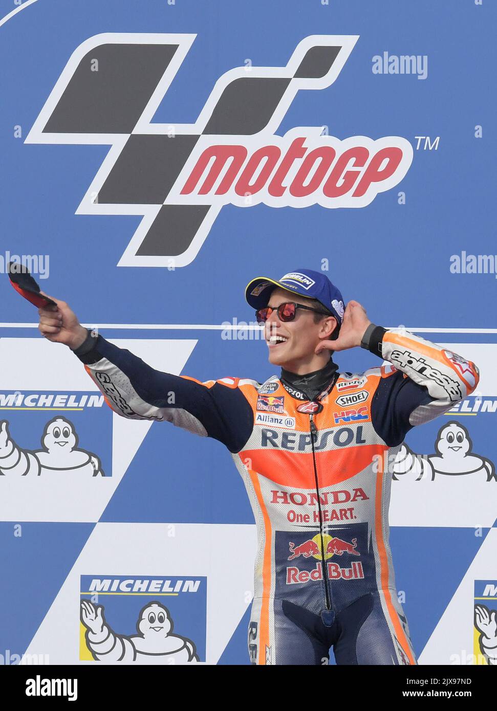 Winner Marc Marquez of Spain for the Repsol Honda Team throws his knee