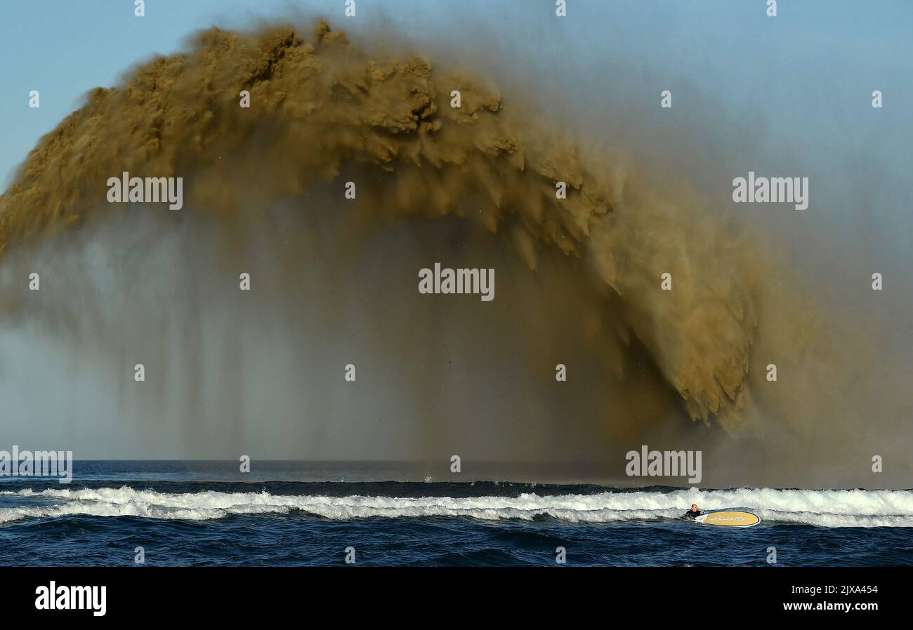 The Balder R, a suction hopper dredger is seen rainbowing sand at ...