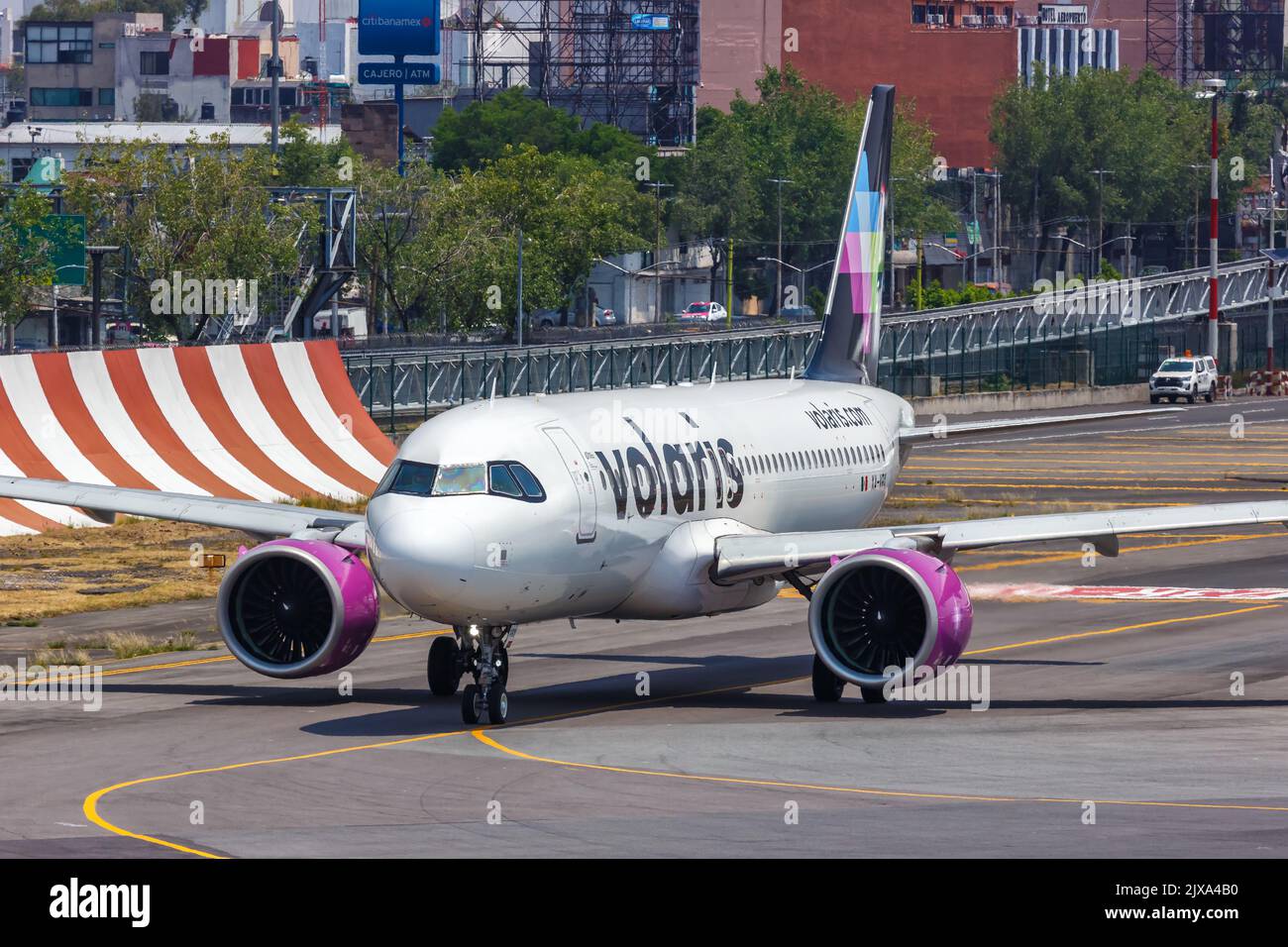 Mexico City, Mexico - April 14, 2022: Volaris Airbus A320neo airplane at Mexico City airport (MEX) in Mexico. Stock Photo