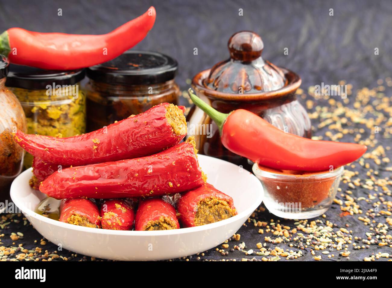 Traditional Homemade Red Chilli Pickle Also Known As Moti Teekhi Lal Mirch Ka Bharwa Bharua Achar Stuffed With Coarsely Powdered Masala Spices Like Se Stock Photo