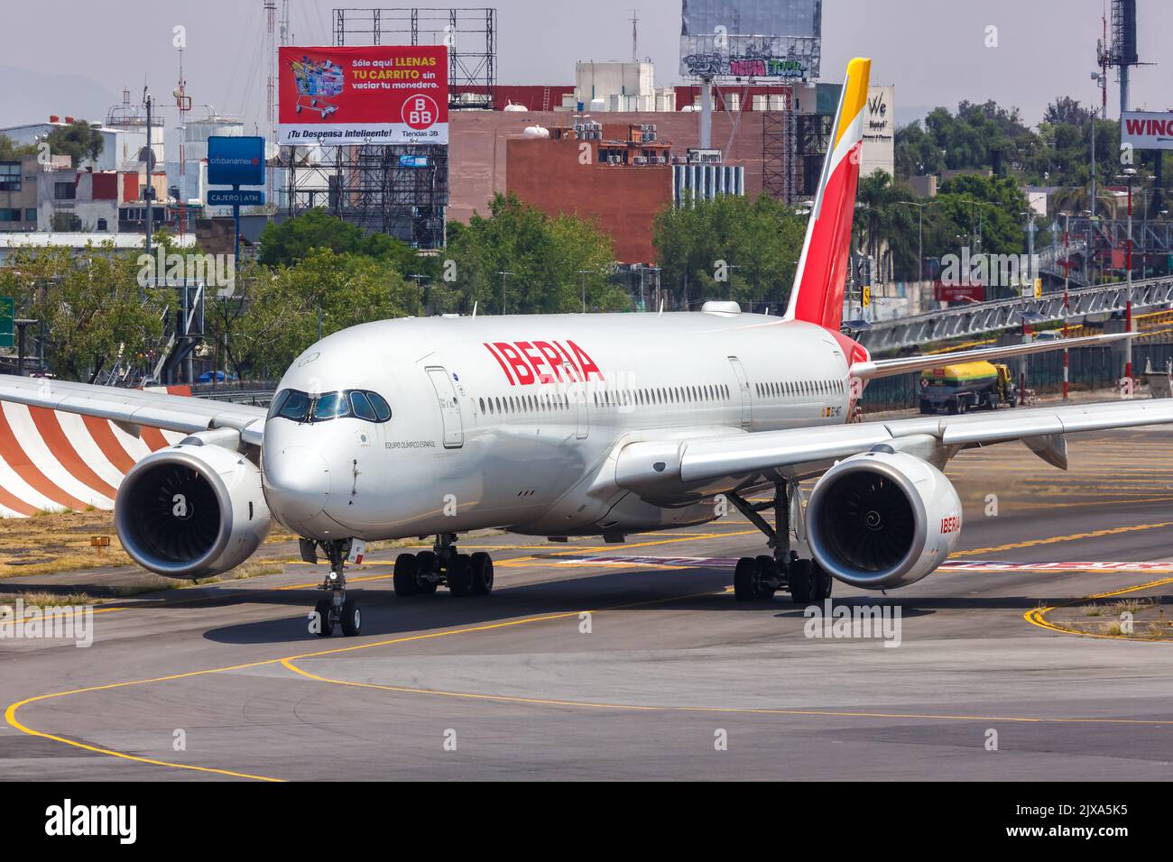 Mexico City, Mexico - April 14, 2022: Iberia Airbus A350-900 airplane at Mexico City airport (MEX) in Mexico. Stock Photo