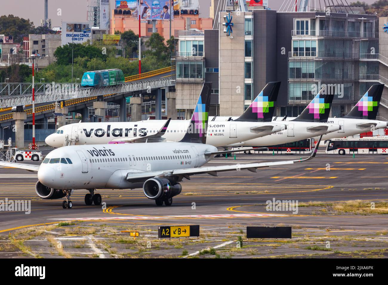 Mexico City, Mexico - April 14, 2022: Volaris Airbus A320 airplanes at Mexico City airport (MEX) in Mexico. Stock Photo