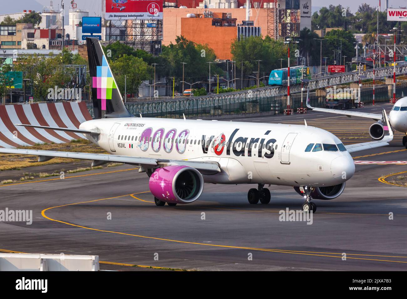 Mexico City, Mexico - April 14, 2022: Volaris Airbus A320neo airplane with the Ghostbusters special livery at Mexico City airport (MEX) in Mexico. Stock Photo
