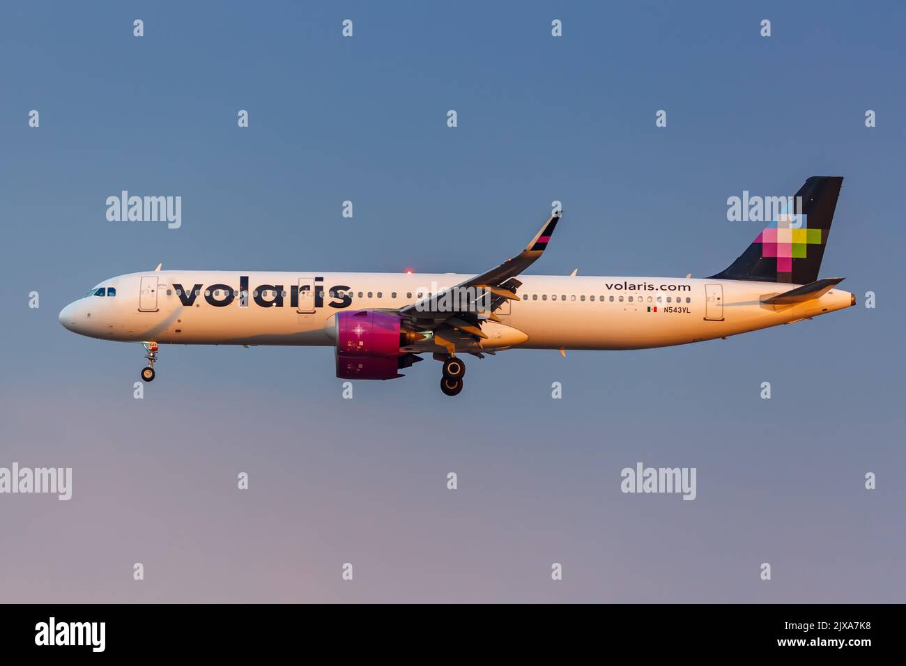 Mexico City, Mexico - April 15, 2022: Volaris Airbus A321neo airplane at Mexico City airport (MEX) in Mexico. Stock Photo