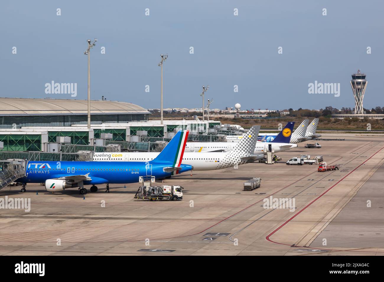 Barcelona, Spain - April 4, 2022: Airplanes at Barcelona airport terminal 1 in Spain. Stock Photo