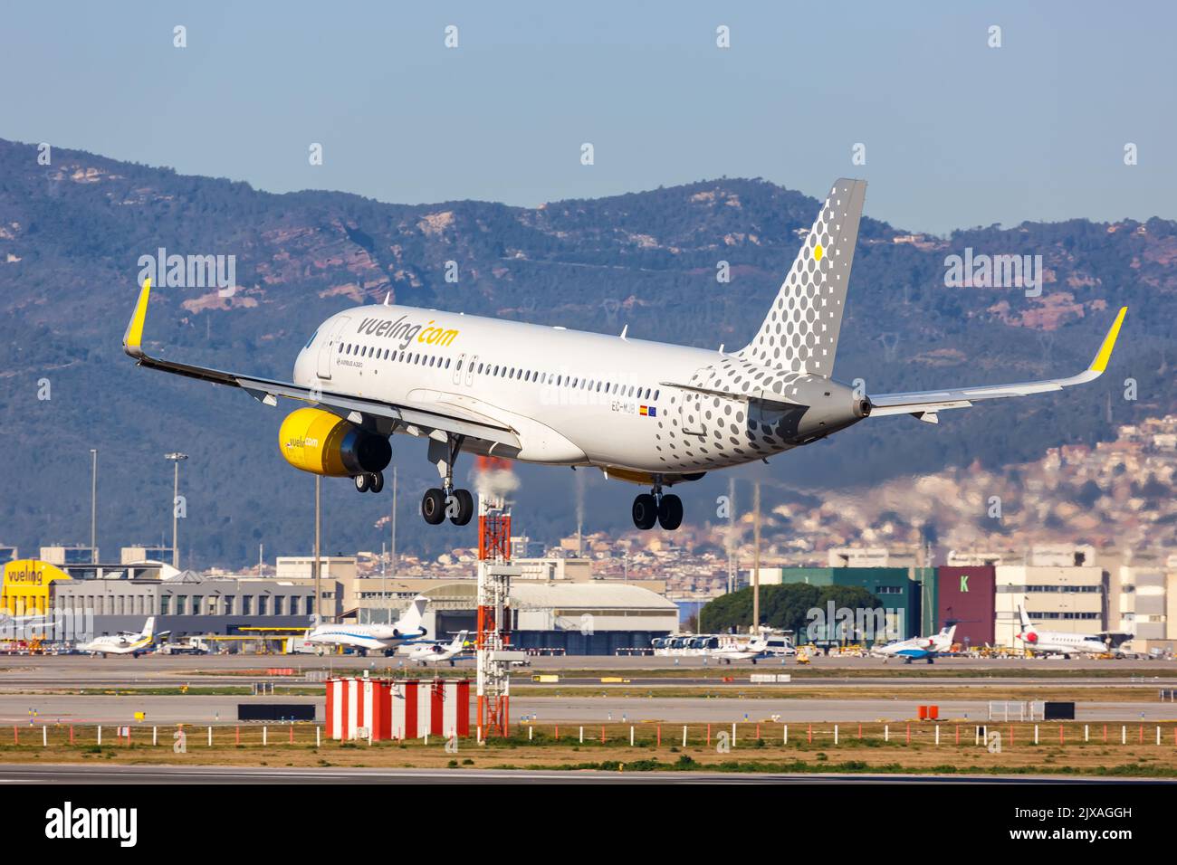 Barcelona, Spain - February 21, 2022: Vueling Airbus A320 airplane at Barcelona airport (BCN) in Spain. Stock Photo