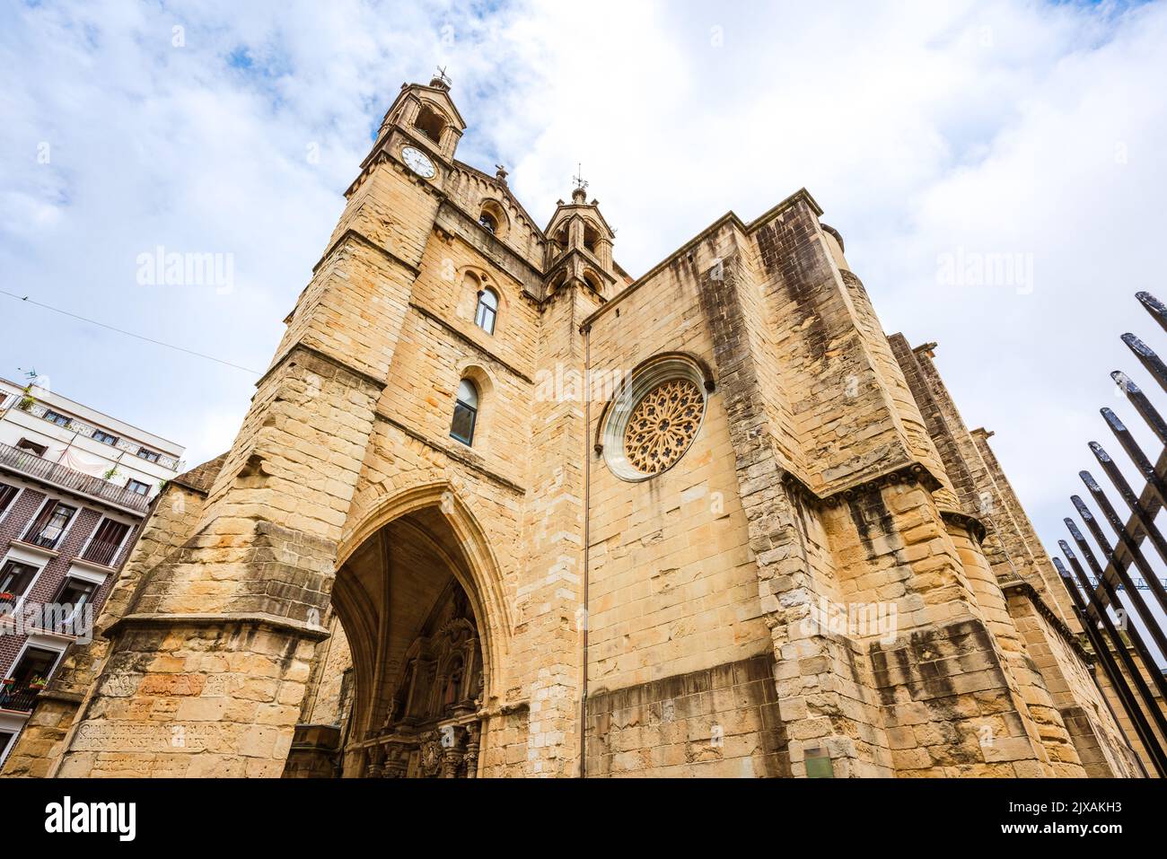 Low angle view of a gothic church against sky in Donostia Spain Stock Photo
