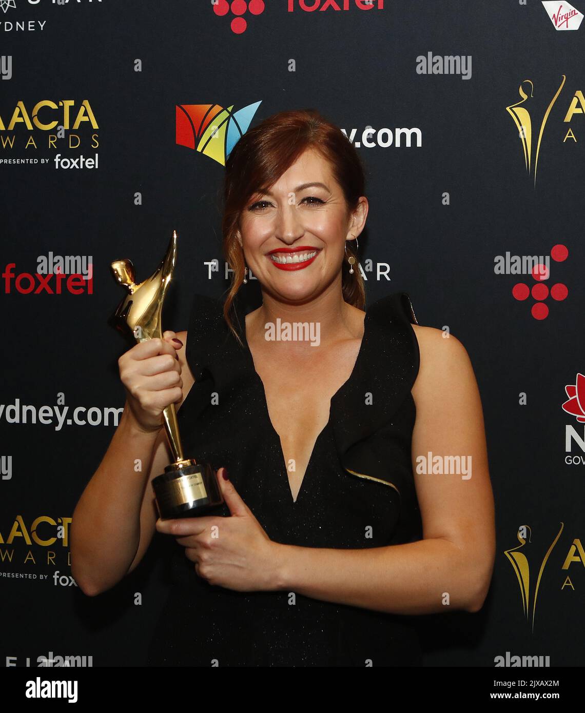 Celia Pacquola poses with the AACTA Award for Best Performance in a