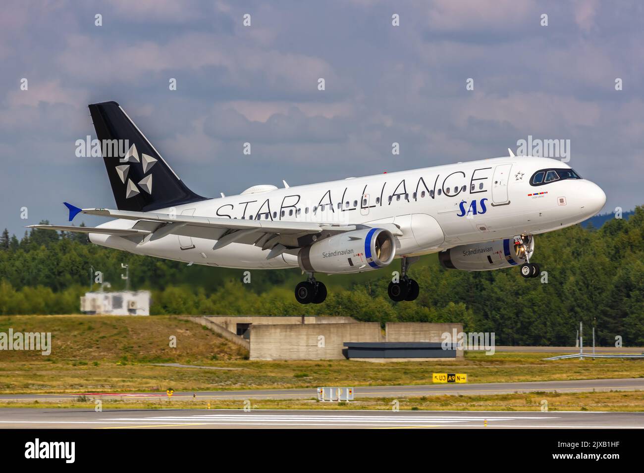 Oslo, Norway - August 15, 2022: SAS Scandinavian Airlines Airbus A319 airplane with Star Alliance special livery at Oslo airport (OSL) in Norway. Stock Photo