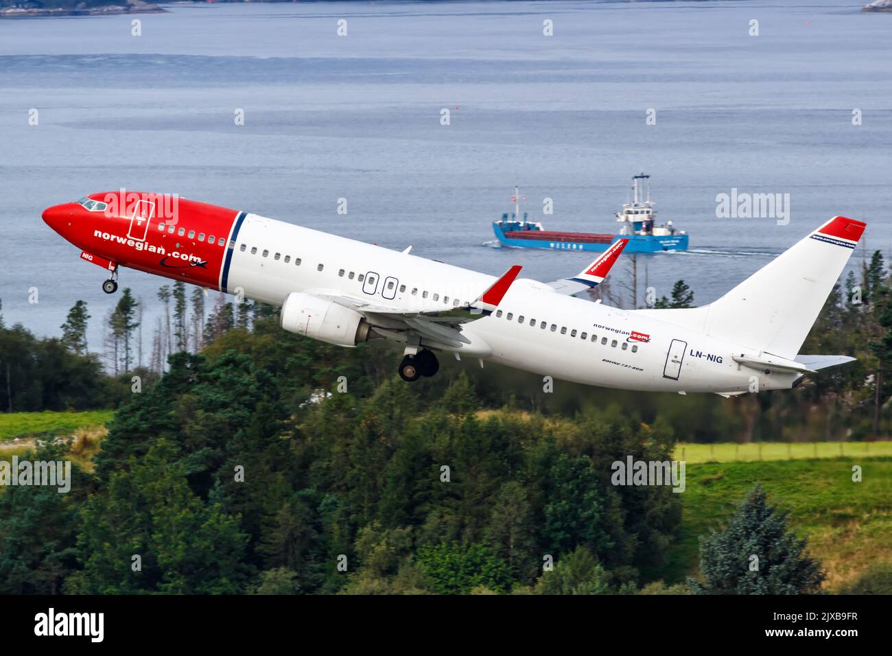 Bergen, Norway - August 18, 2022: Norwegian Boeing 737-800 airplane at Bergen airport (BGO) in Norway. Stock Photo