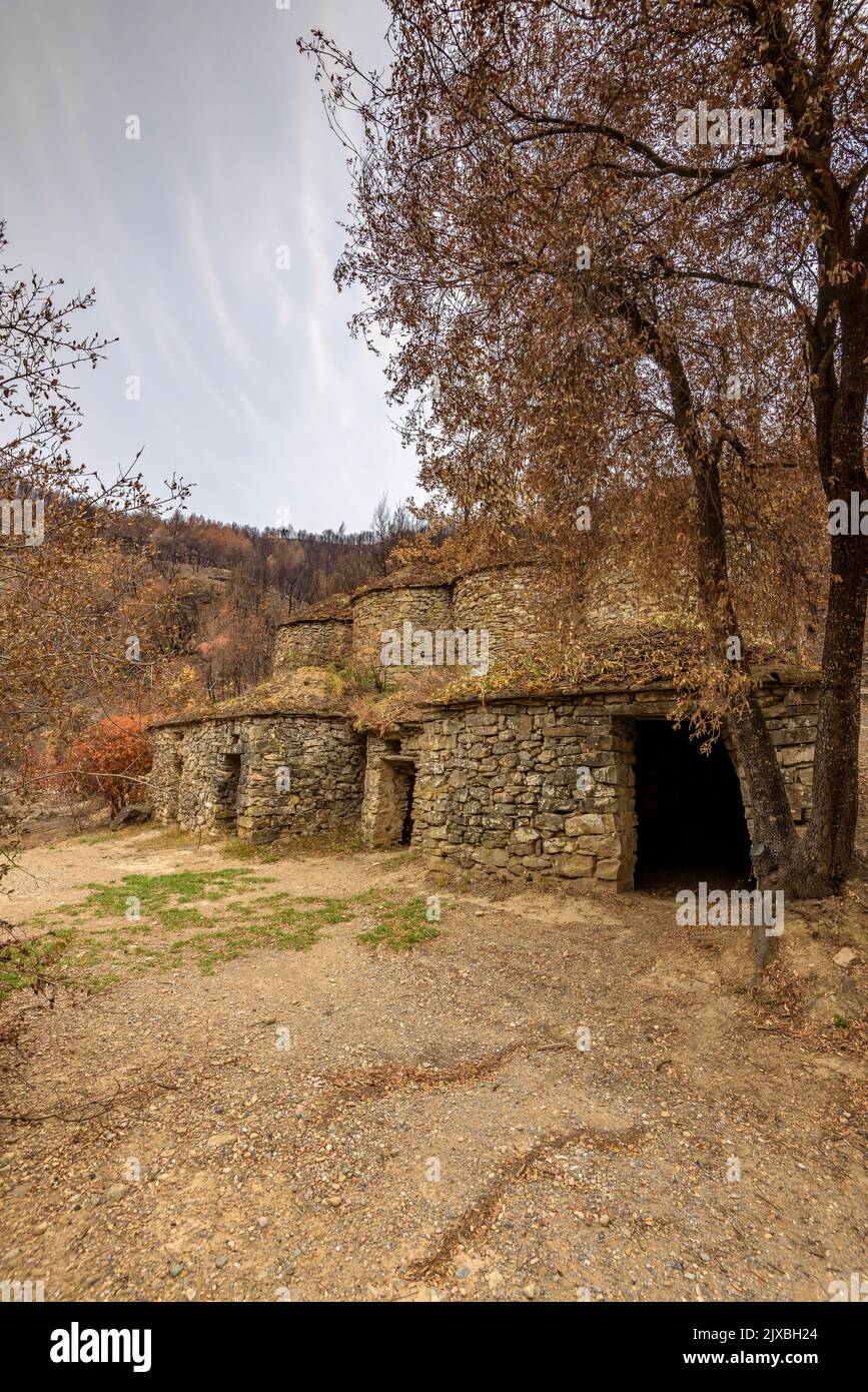 Tubs (Tines in catalan) and the Flequer valley after the 2022 Pont de Vilomara fire in the Sant Llorenç del Munt i l'Obac Natural Park Catalonia Spain Stock Photo