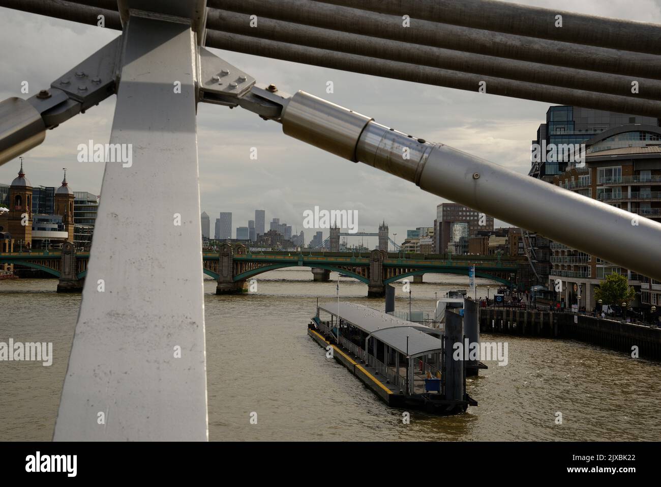 The City of London from the Millennium Bridge. The struts of the bridge