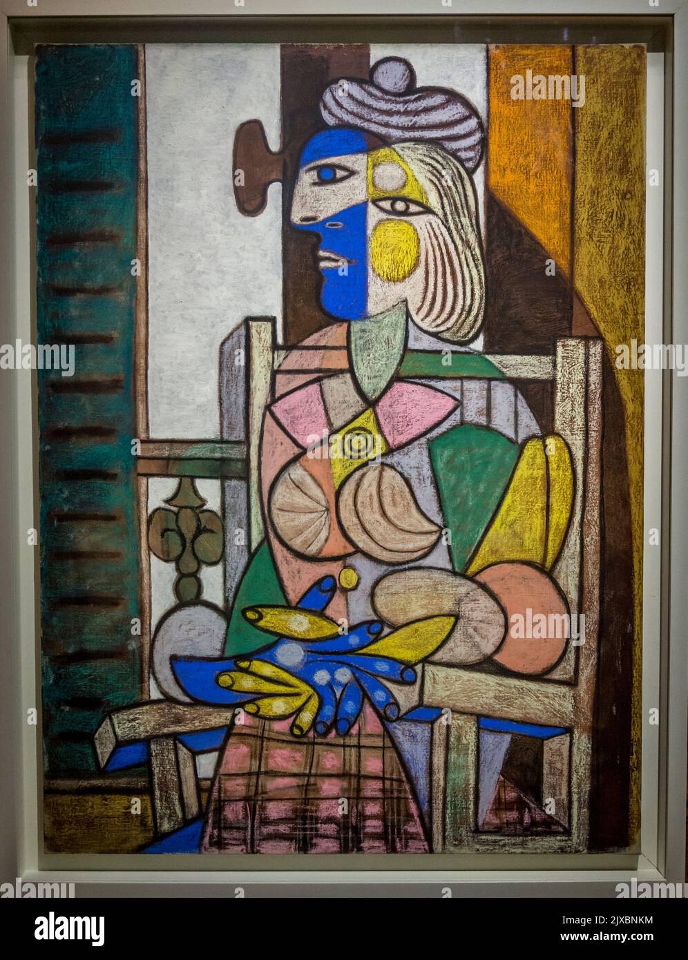 'Woman sitting on an armchair' painting, Picasso Museum, an art gallery located in the Hôtel Salé in rue de Thorigny, in the Marais district dedicated Stock Photo