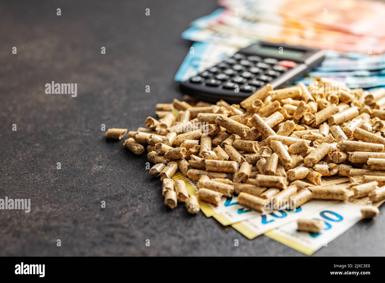 Wooden pellets, biofuel with euro money. Ecologic fuel made from