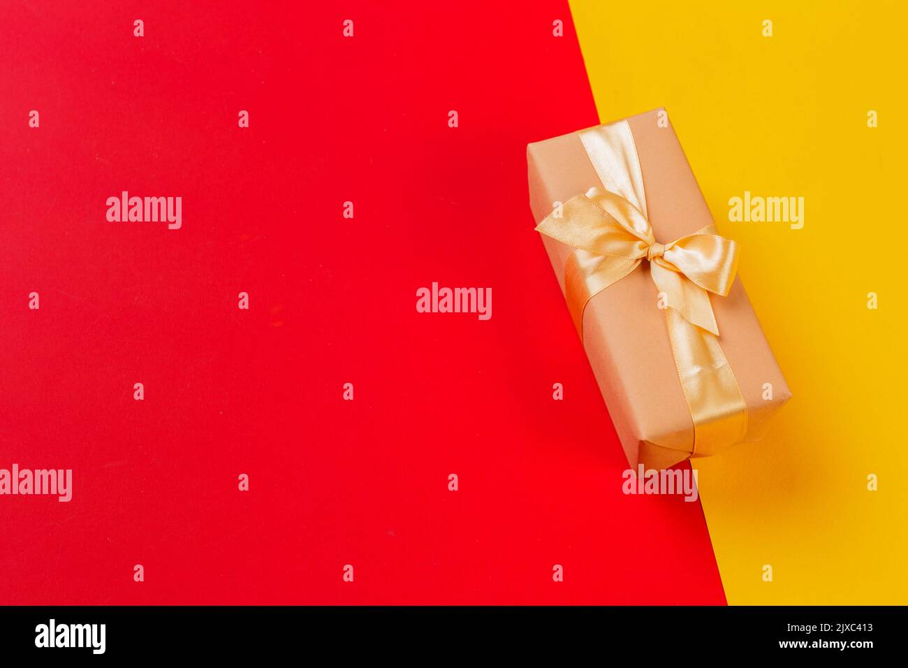 gift box on color background Stock Photo - Alamy