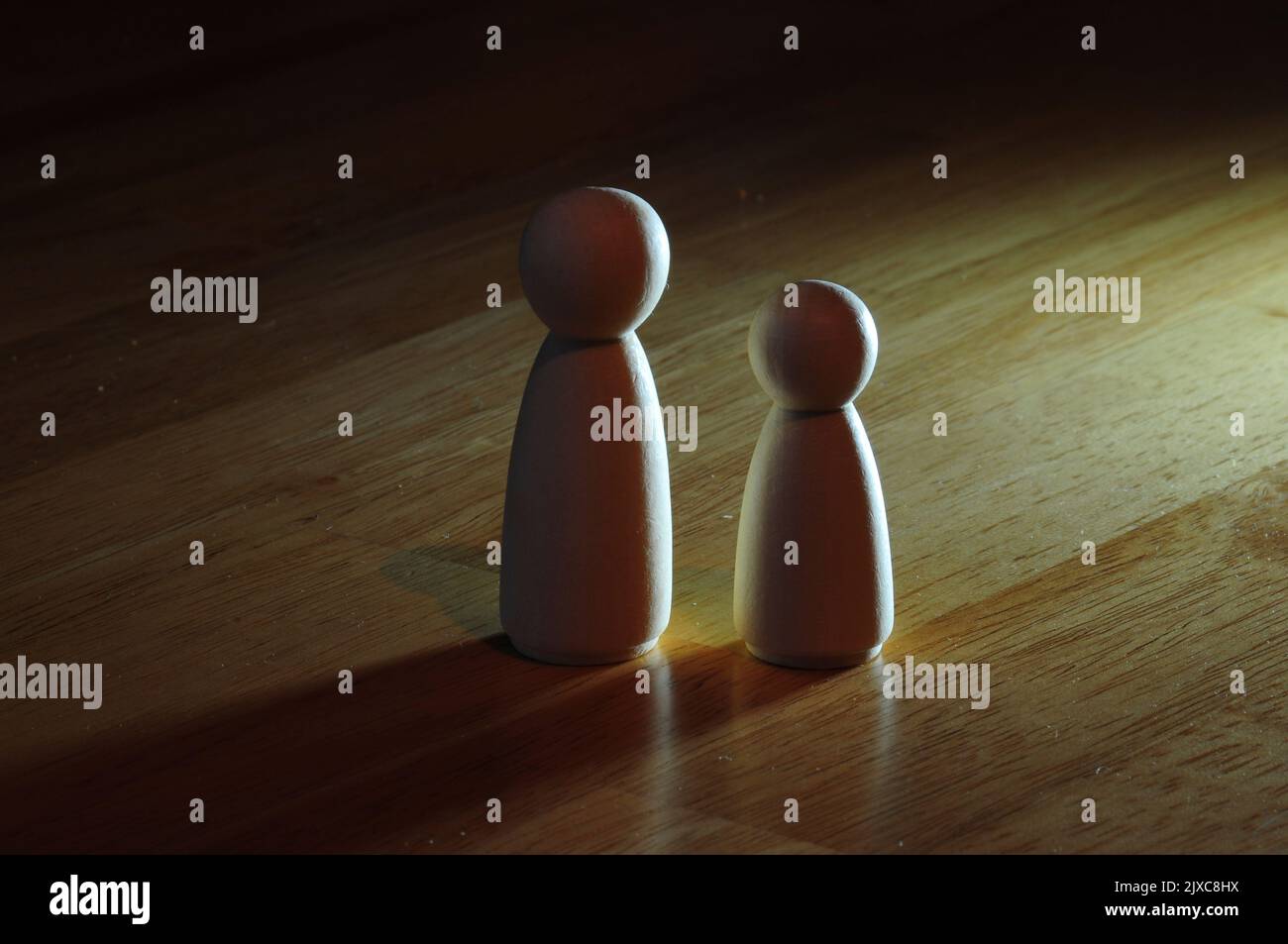 Wooden toy figures or skittles Stock Photo
