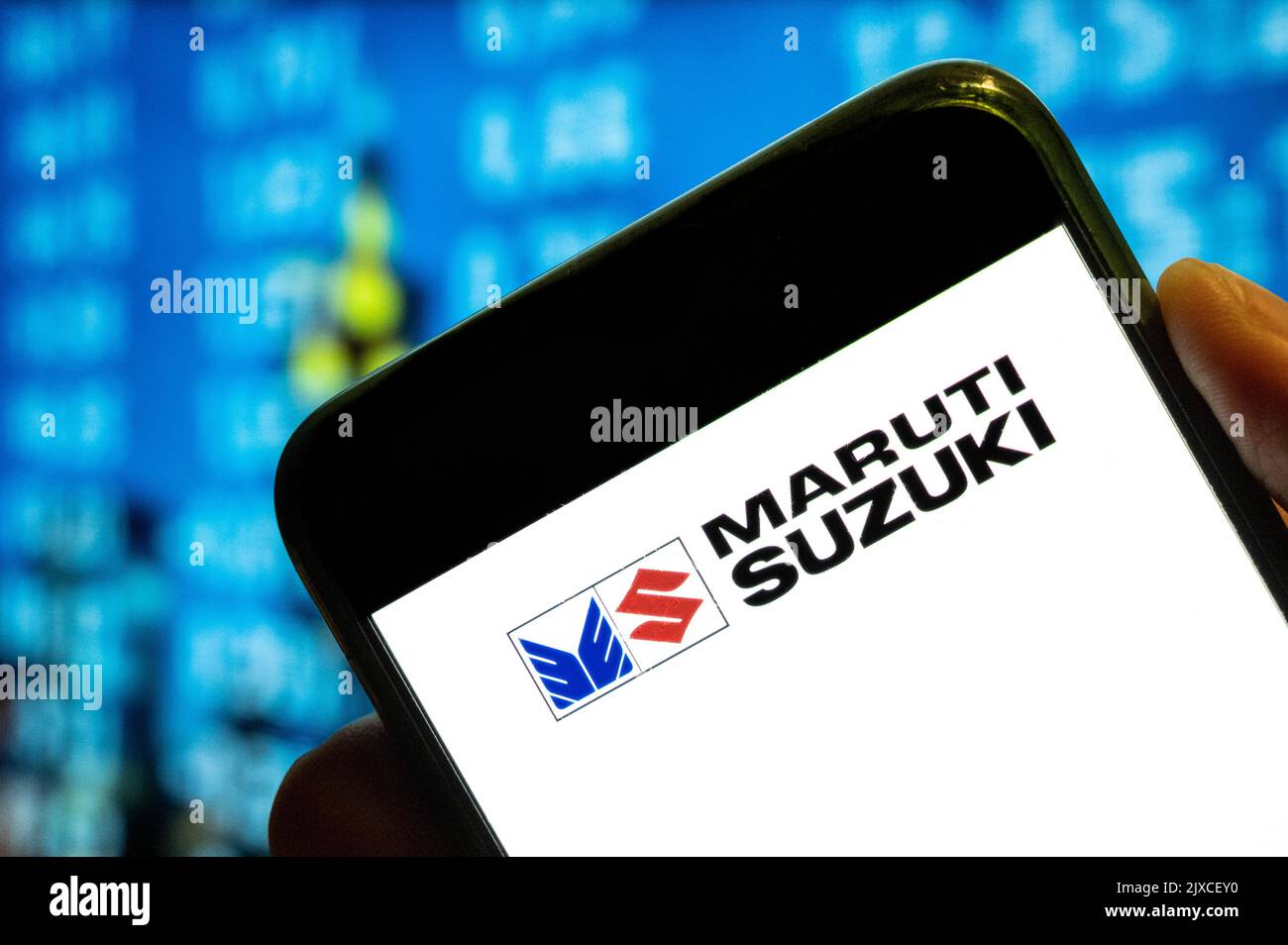 In this photo illustration, the Japanese multinational automobile manufacturer Maruti Suzuki logo is displayed on a smartphone screen. Stock Photo