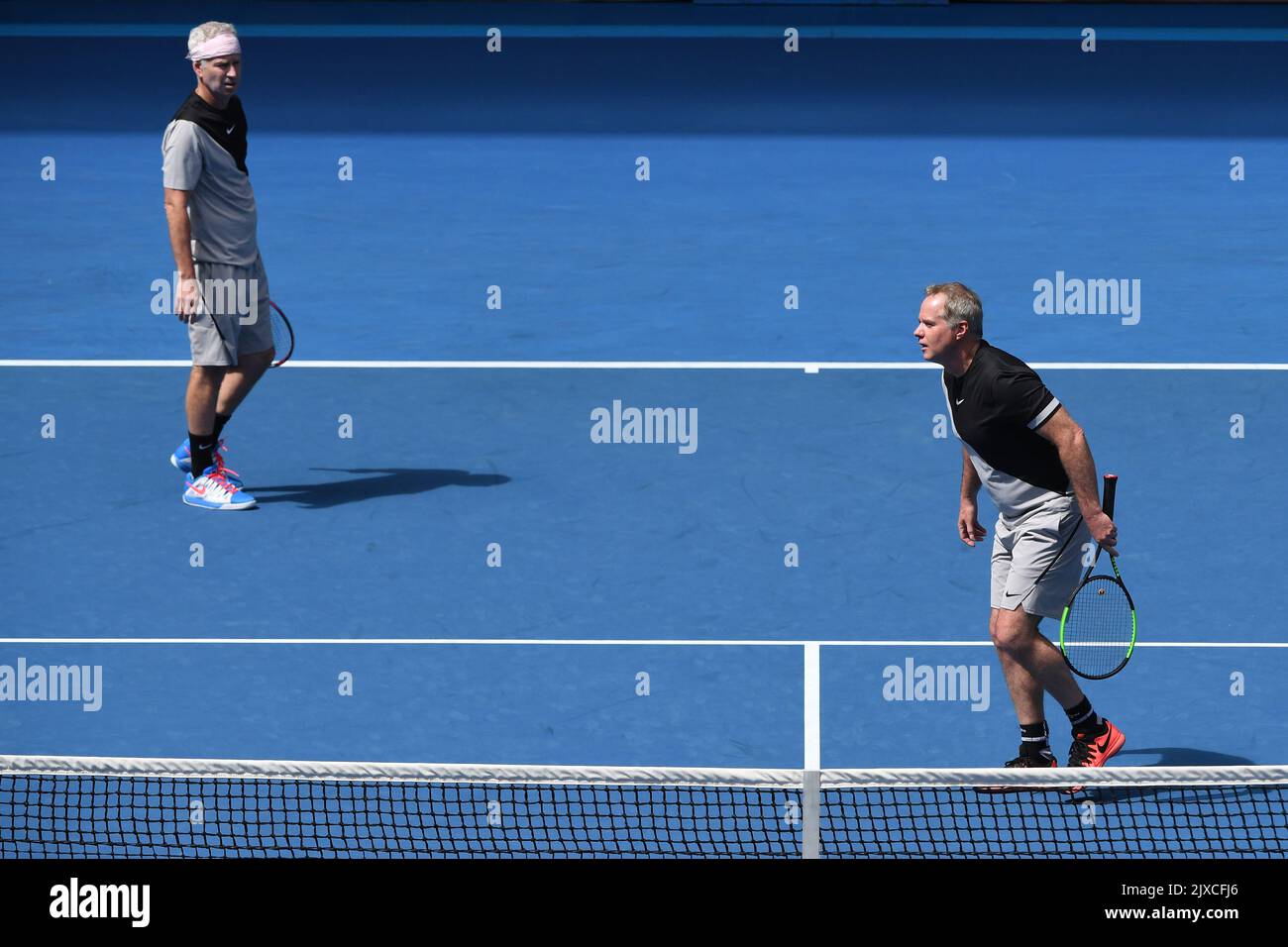 John McEnroe (left) and Patrick McEnroe (right) of the USA in action