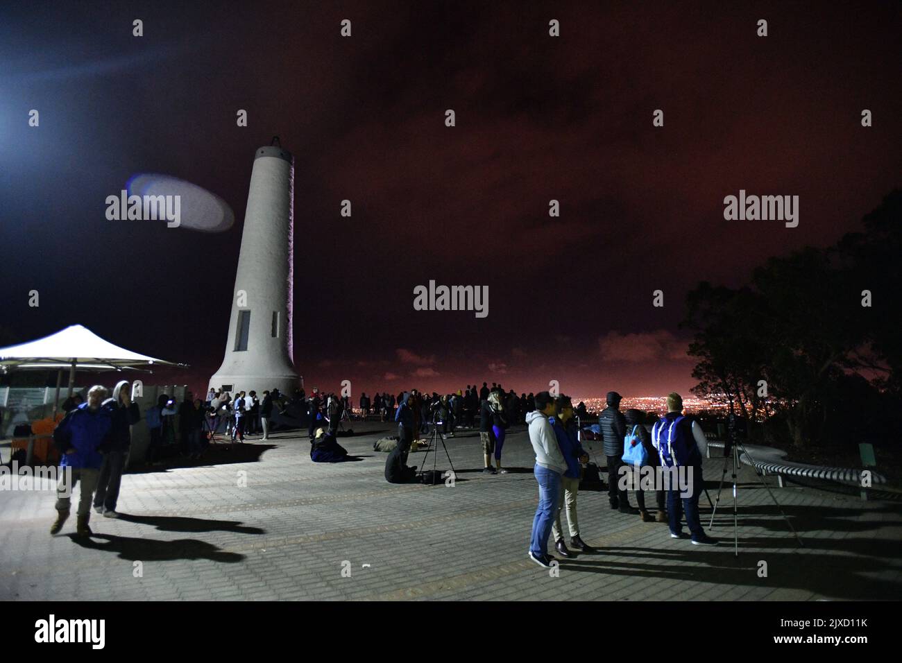 People gather to watch the moon during a super blue blood moon lunar ...