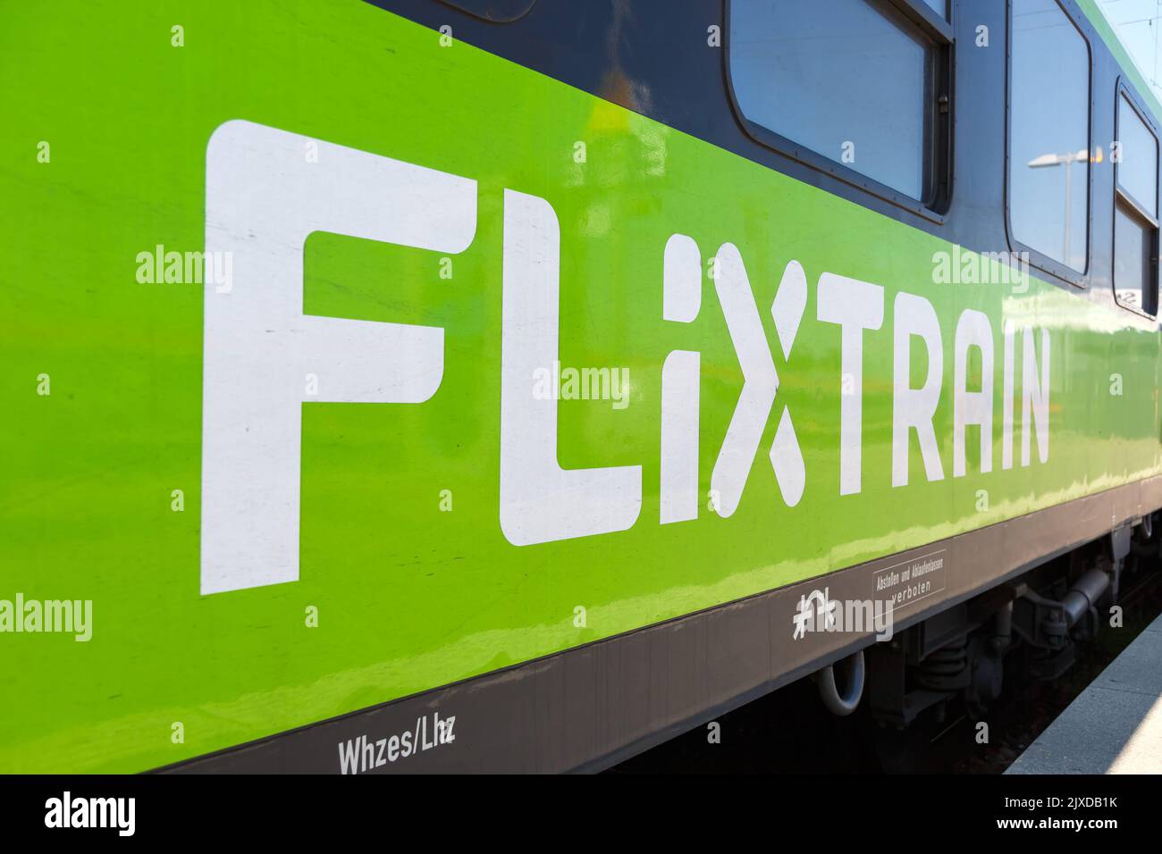 Stuttgart, Germany - April 28, 2022: Flixtrain logo on a train at main railway station in Stuttgart, Germany. Stock Photo