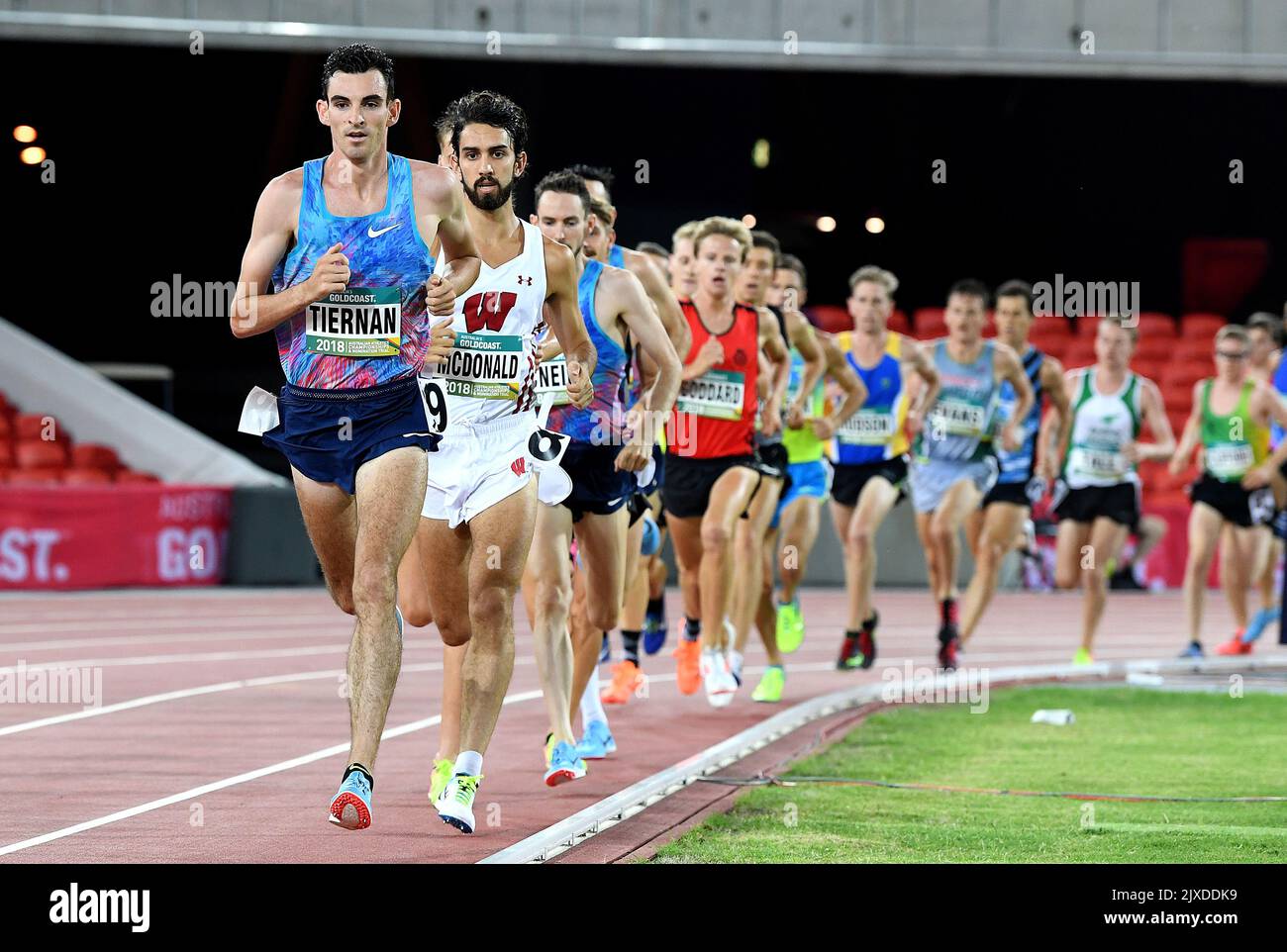 Morgan McDonald of NSW (2nd) sits behind Patrick Tiernan of Queensland ...