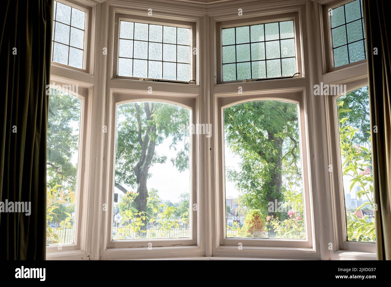 A bay window on a sunny afternoon in a south London residential home, on 4th September 2022, in London, England. Stock Photo