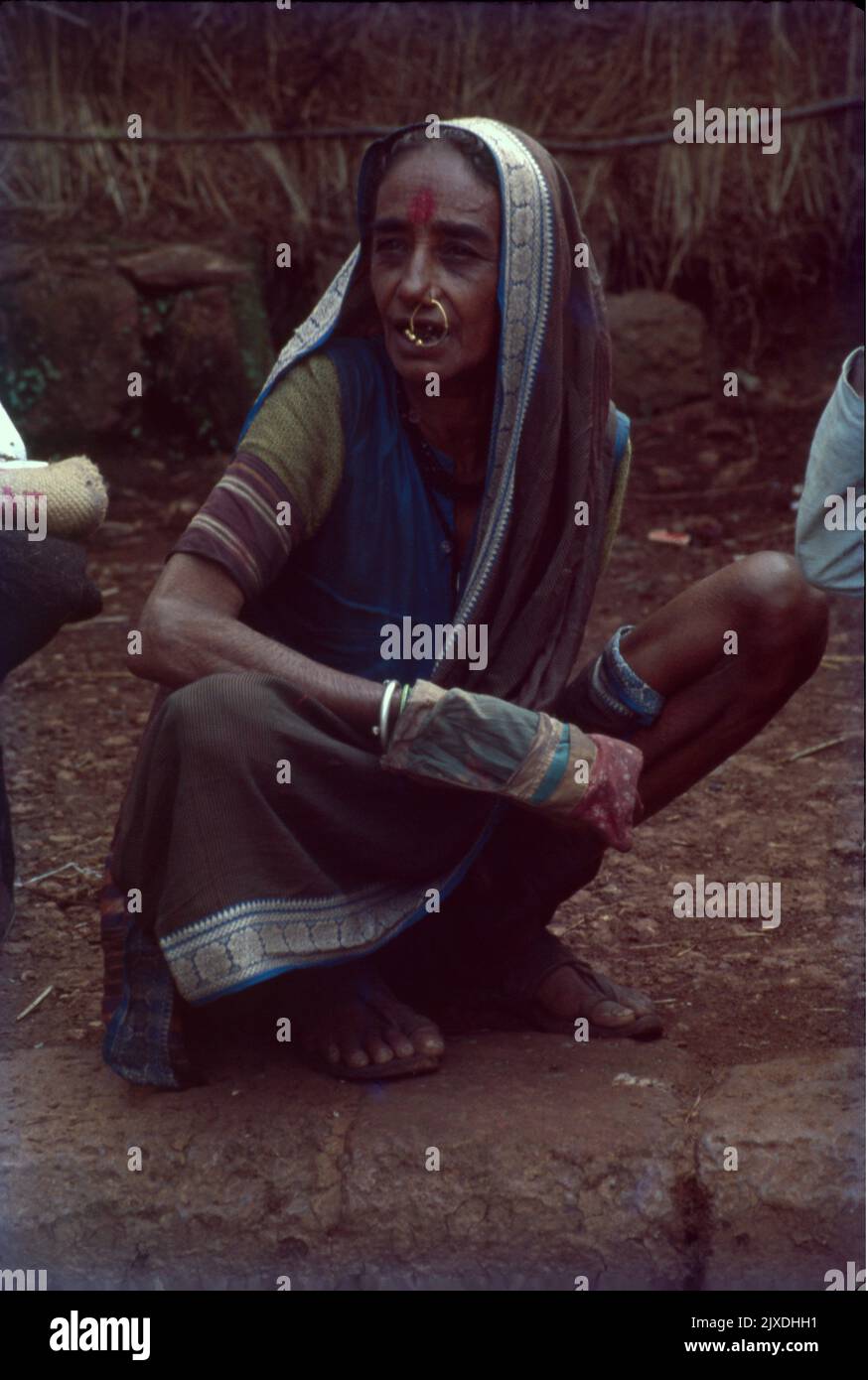 Old Lady, Preparing Tobacco Stock Photo