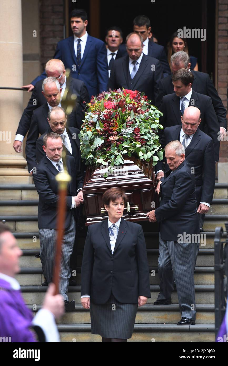 Family members follow the casket of the late Sir Nicholas Michael ...