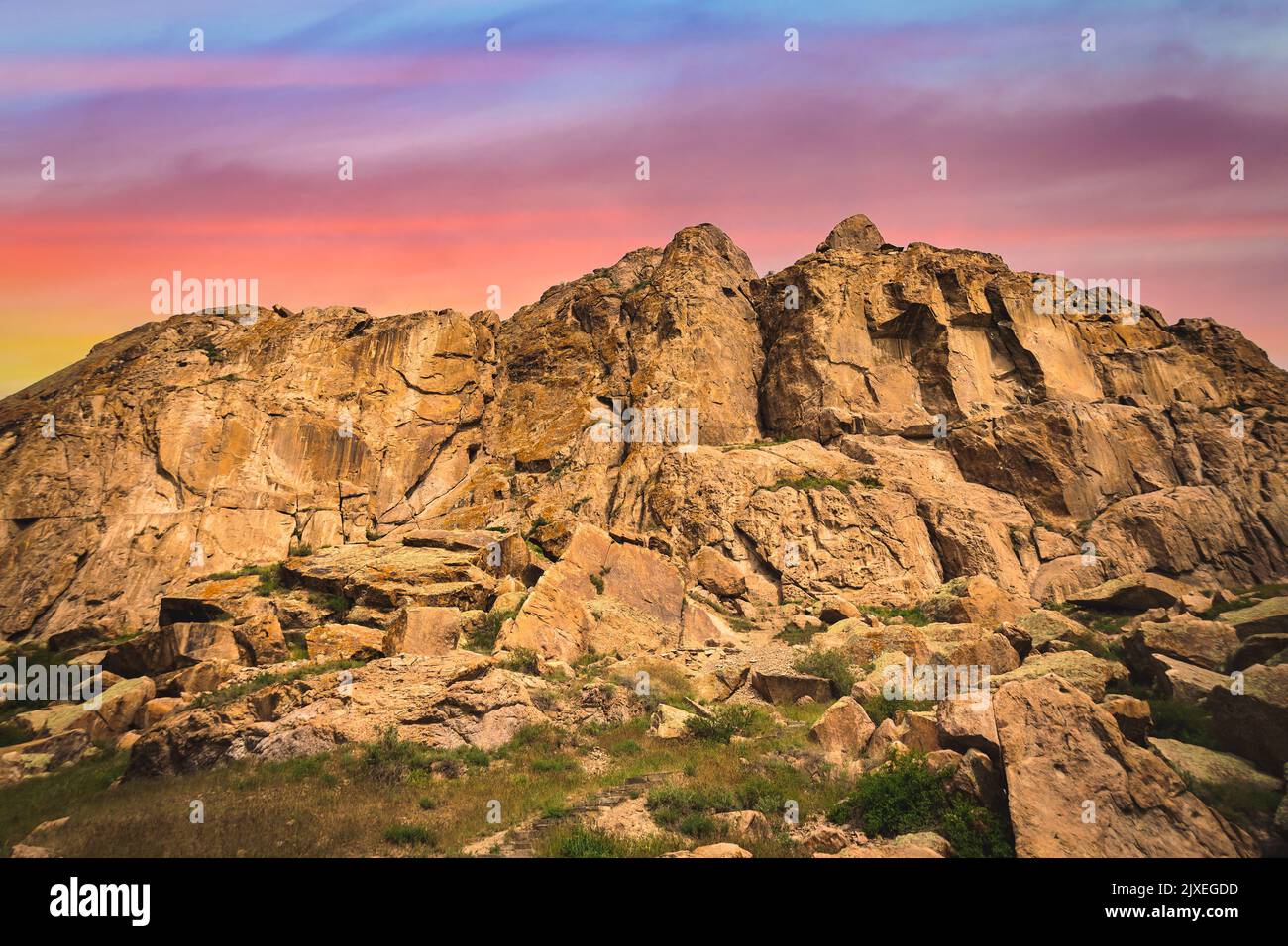 Historically archaeological rock with ancient rock signs in the Tamgaly ...