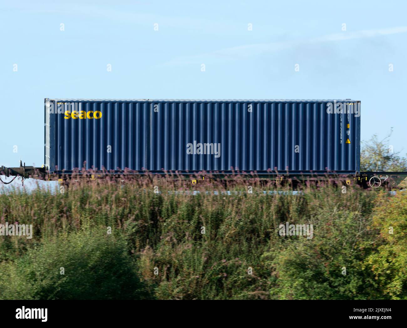 Seaco shipping container on a freightliner train, Warwickshire, UK Stock Photo