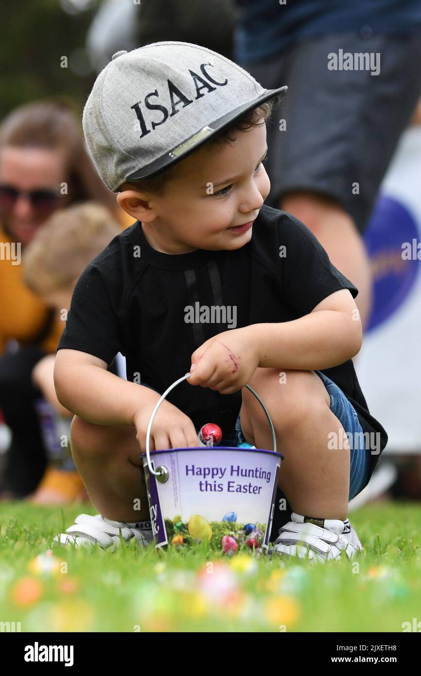 Children collect chocolate eggs during the annual Cadbury Easter Egg