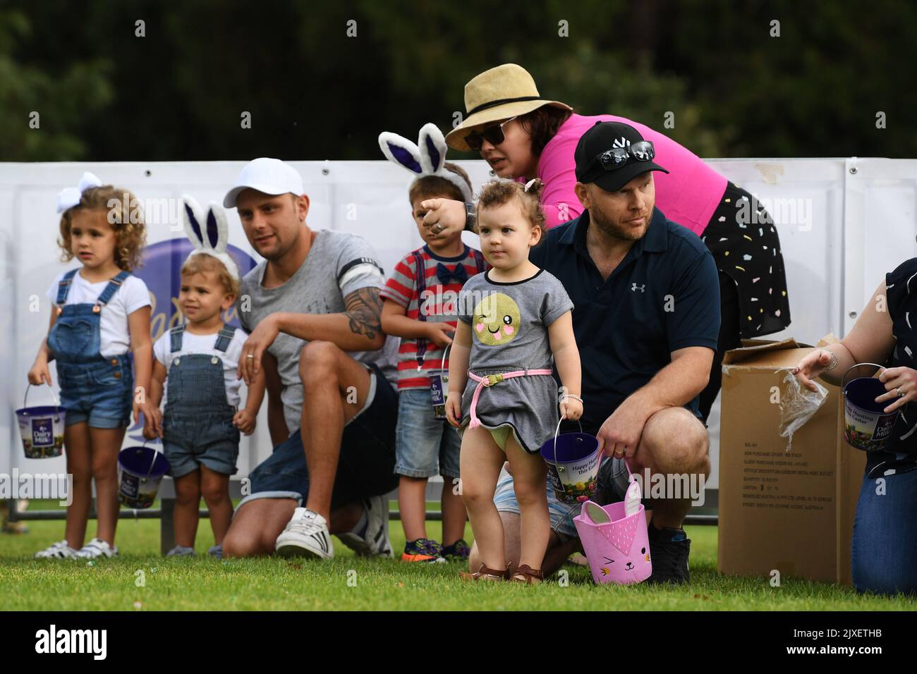 Children collect chocolate eggs during the annual Cadbury Easter Egg