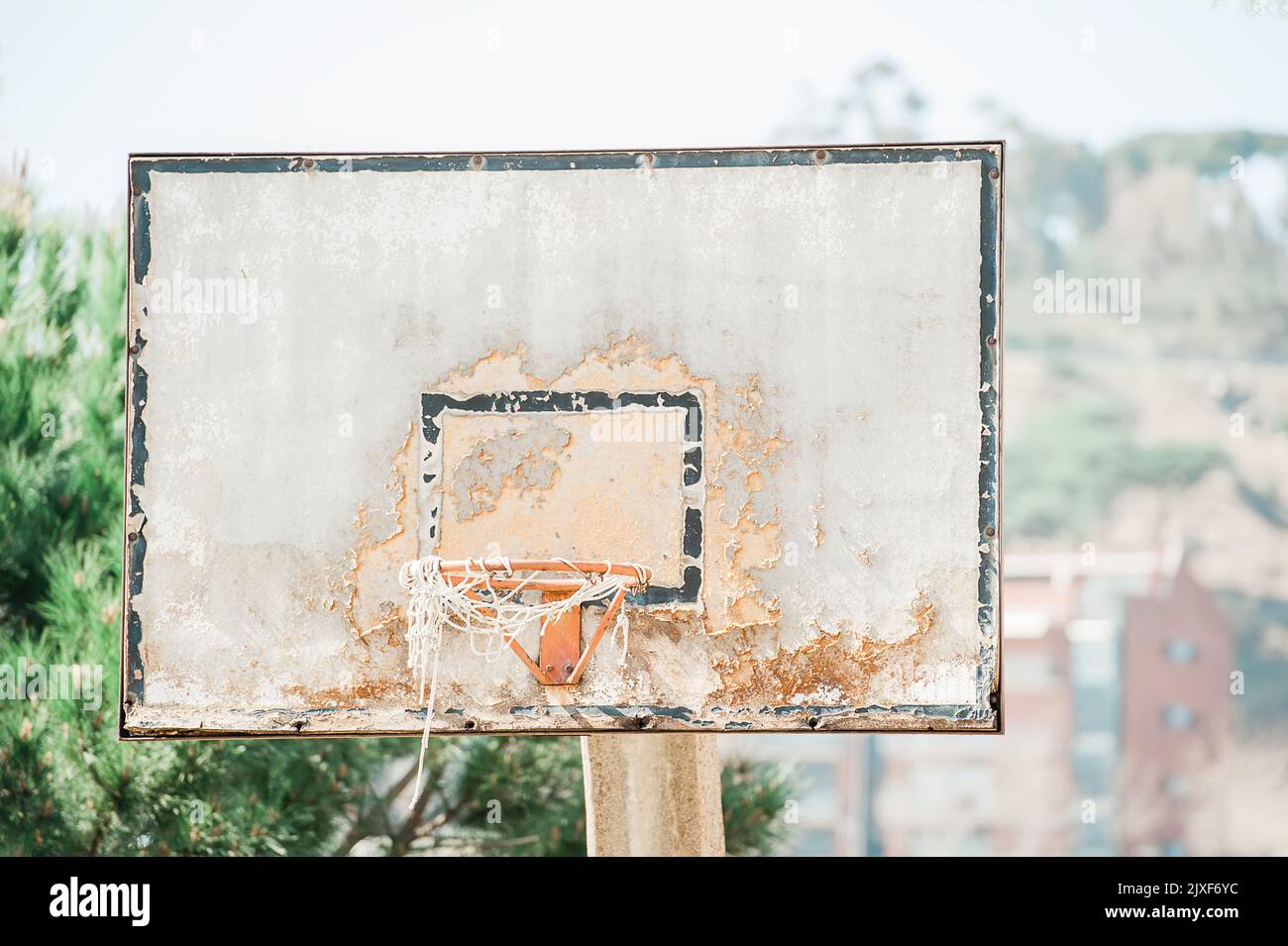 scratched basketball hoop in street basketball court Stock Photo Alamy